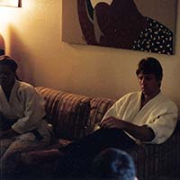 Natasha and Shihan Brian Workman relaxing on couch